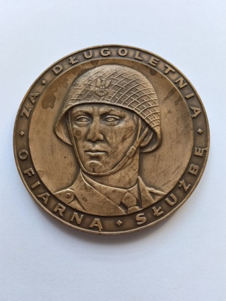 Medal duży z brązu za długoletnią służbę.
