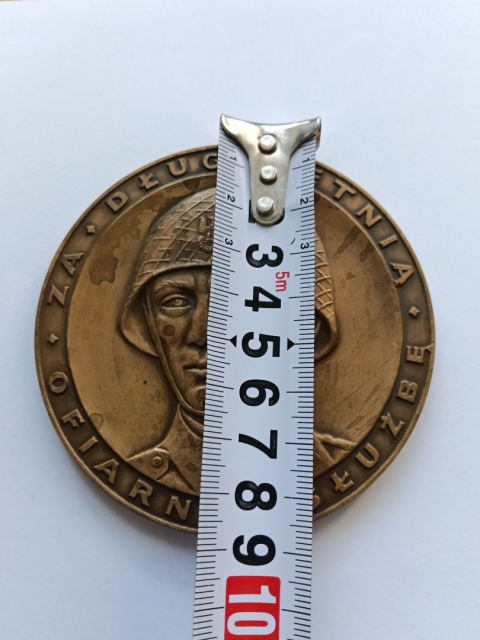 Medal duży z brązu za długoletnią służbę.